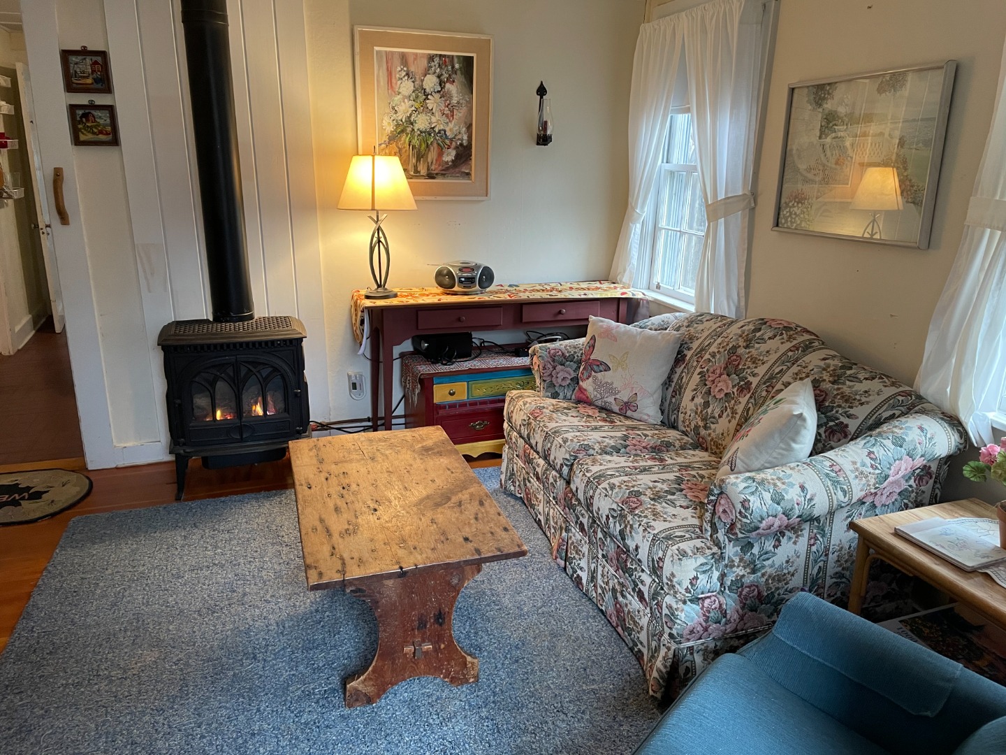 27 Pinehurst Road Edgartown, MA 02539 - Photo 5 of 6 a living room with furniture and a fireplace