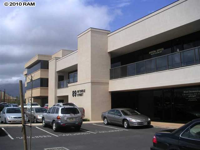 89 Ho'okele Street, Unit 104 Kahului, HI 96732 - Photo 3 of 3 a car parked in front of a building