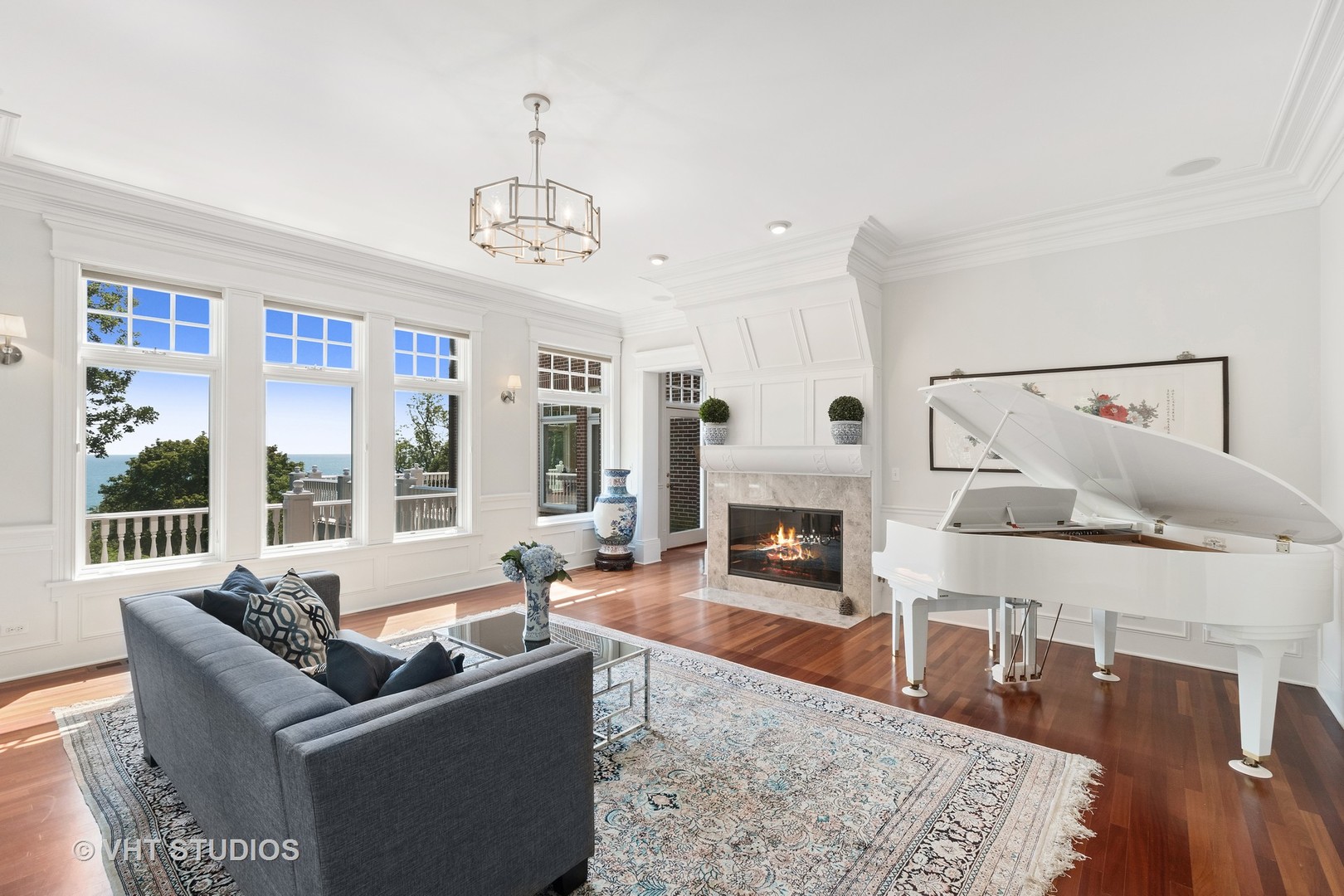 738 Tower Road Winnetka, IL 60093 - Photo 12 of 58 a living room with furniture and a fireplace