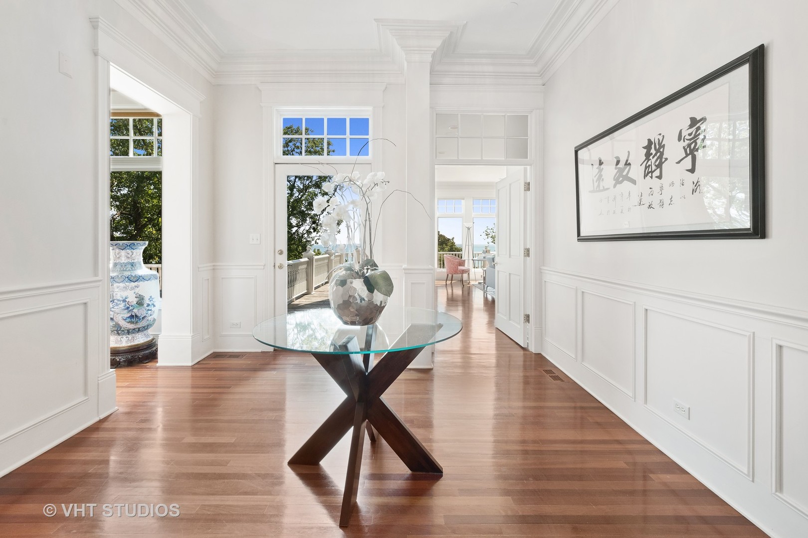 738 Tower Road Winnetka, IL 60093 - Photo 16 of 58 a view of a livingroom with furniture and wooden floor