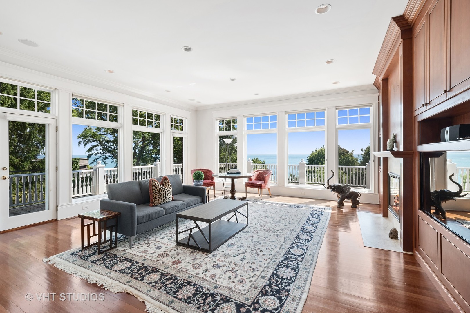 738 Tower Road Winnetka, IL 60093 - Photo 27 of 58 a living room with furniture large window and a table