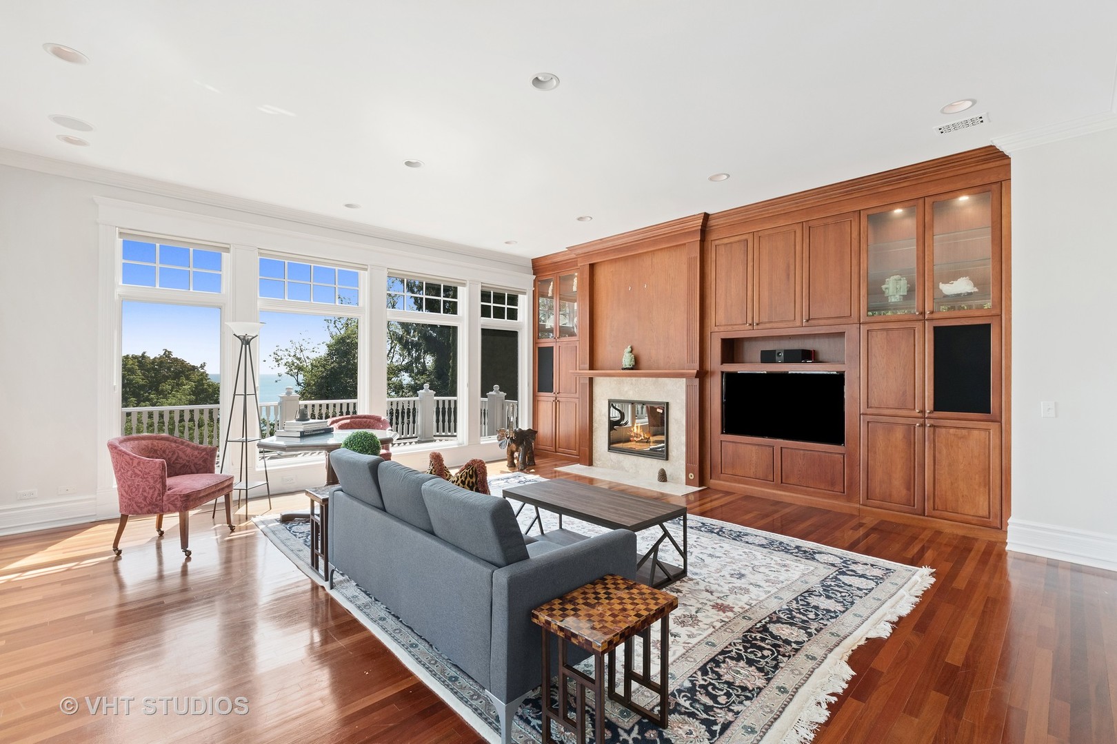 738 Tower Road Winnetka, IL 60093 - Photo 28 of 58 a living room with furniture fireplace and large window