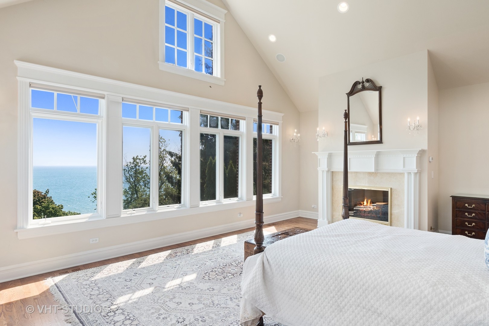 738 Tower Road Winnetka, IL 60093 - Photo 31 of 58 a bedroom with bed and a fireplace