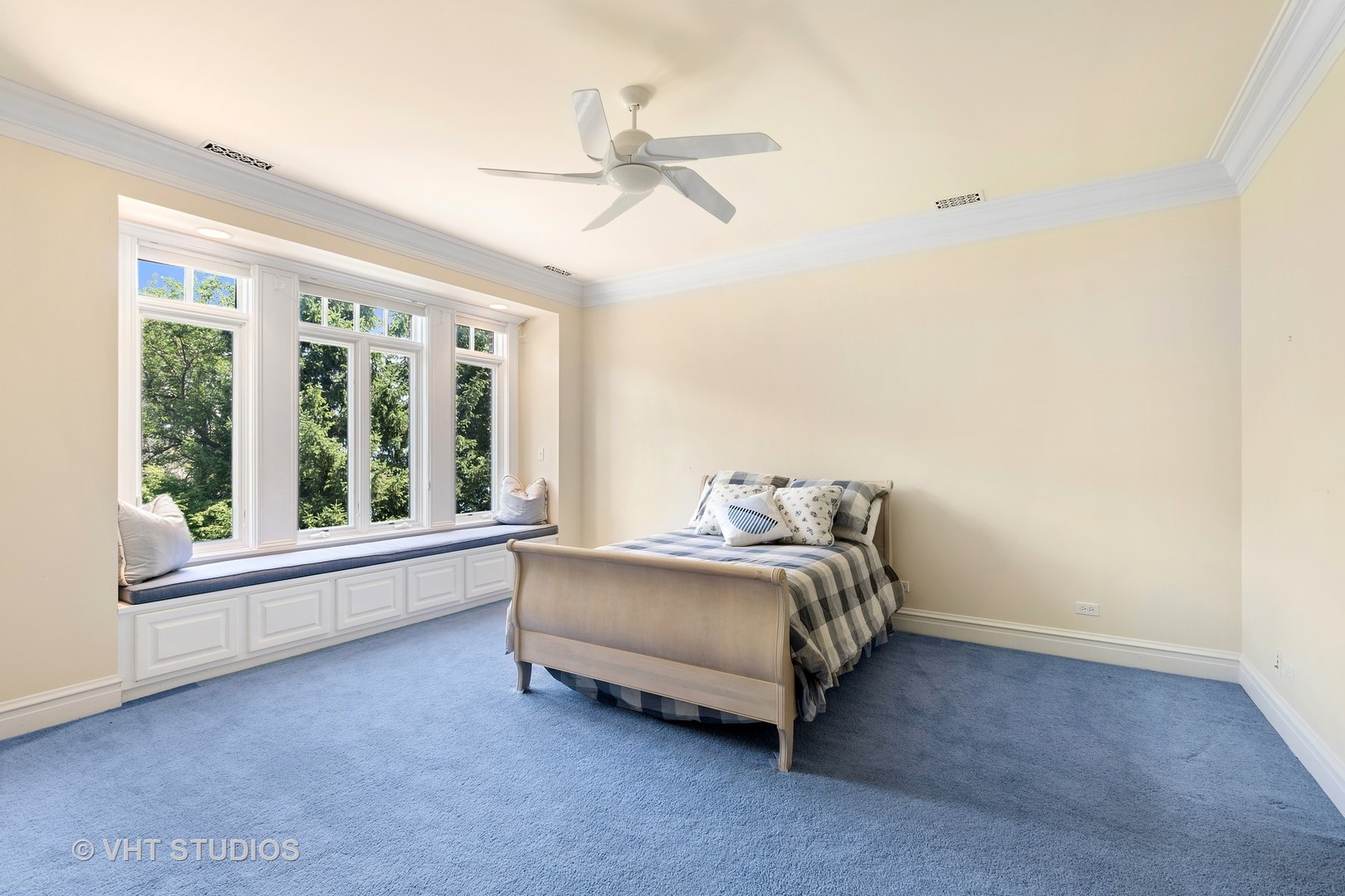 738 Tower Road Winnetka, IL 60093 - Photo 36 of 58 a bedroom with a bed and a large window