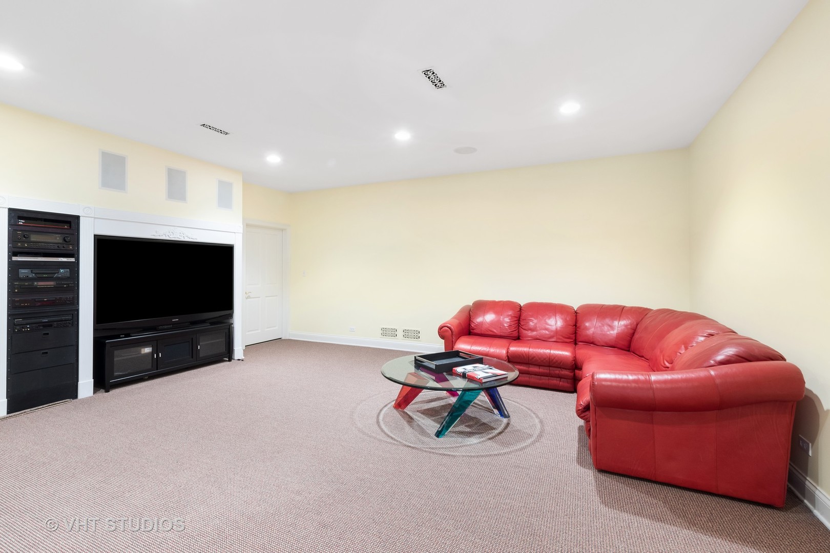738 Tower Road Winnetka, IL 60093 - Photo 41 of 58 a living room with furniture and a flat screen tv