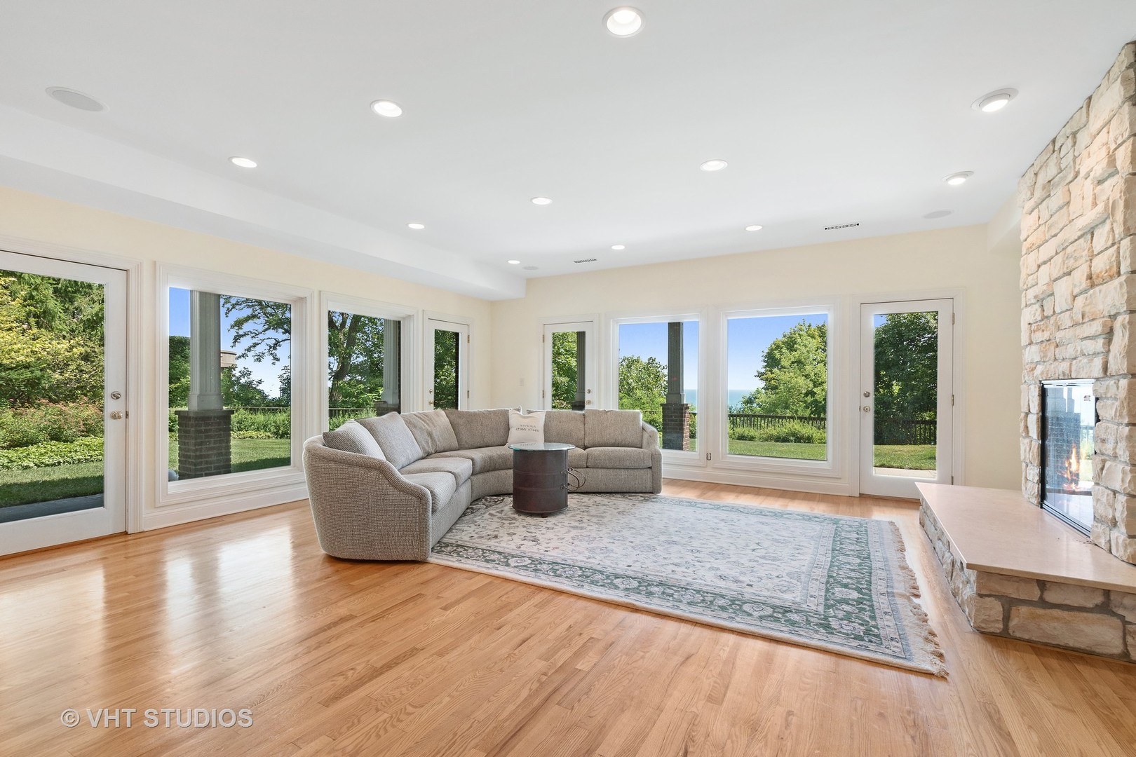 738 Tower Road Winnetka, IL 60093 - Photo 42 of 58 a living room with furniture and large windows