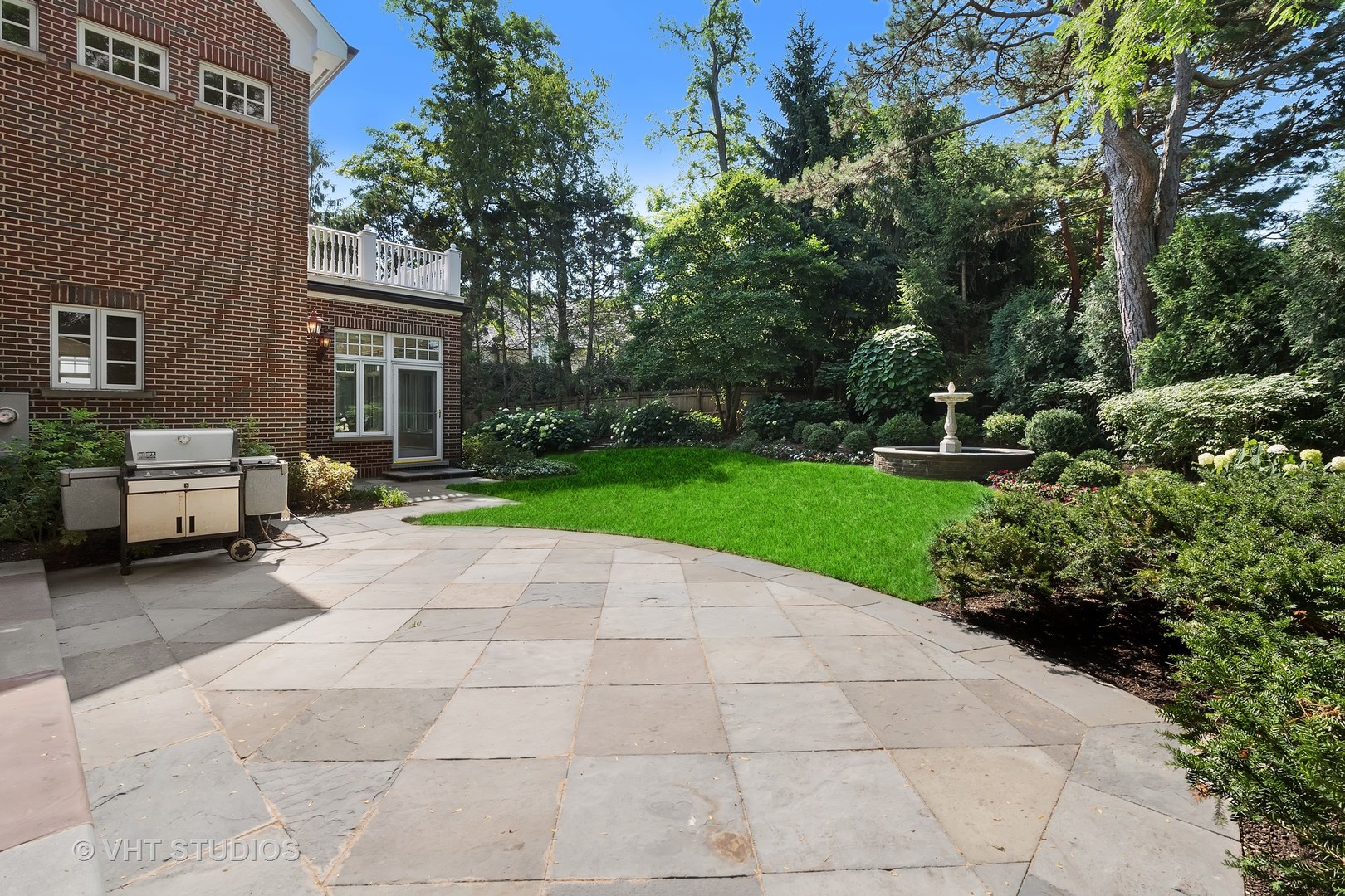 738 Tower Road Winnetka, IL 60093 - Photo 48 of 58 a view of a patio with a garden