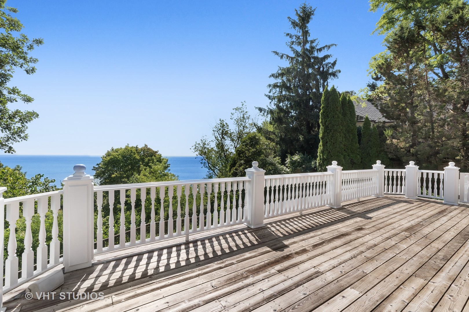 738 Tower Road Winnetka, IL 60093 - Photo 49 of 58 a view of a wooden roof deck