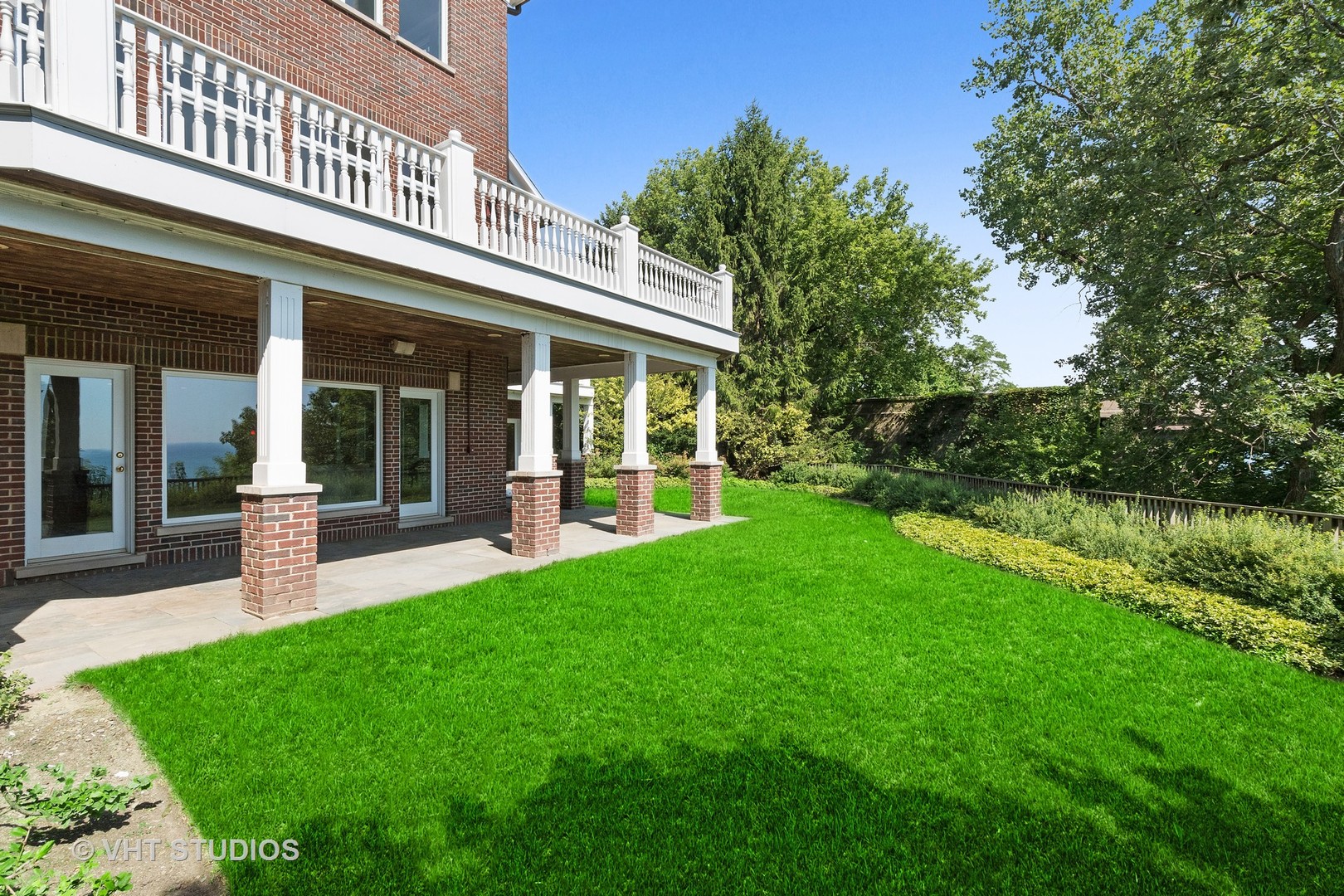 738 Tower Road Winnetka, IL 60093 - Photo 54 of 58 a view of a house with a yard and sitting area