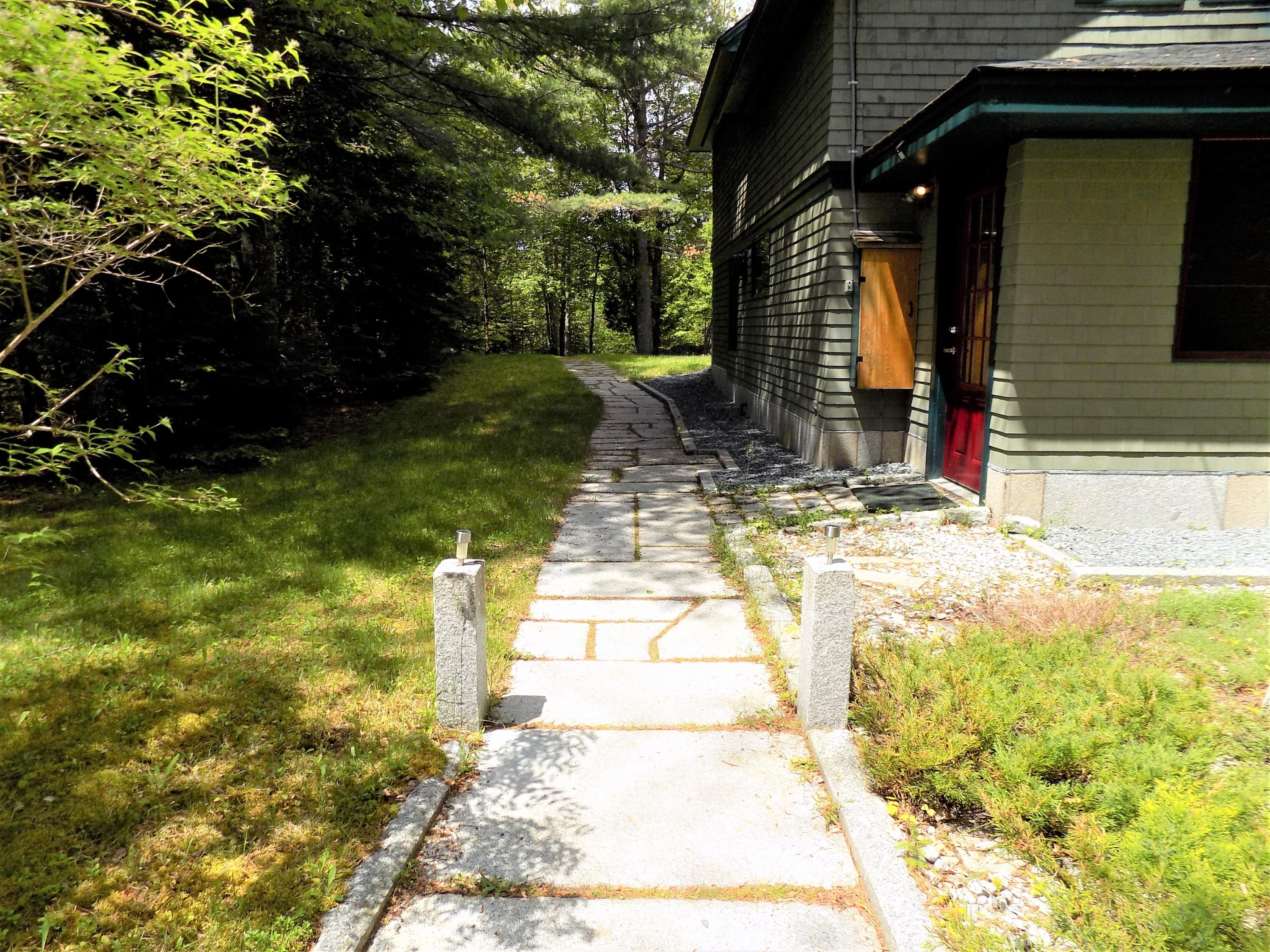 43 Pomroy Road Hancock, ME 04640 - Photo 2 of 40 beautifully landscaped