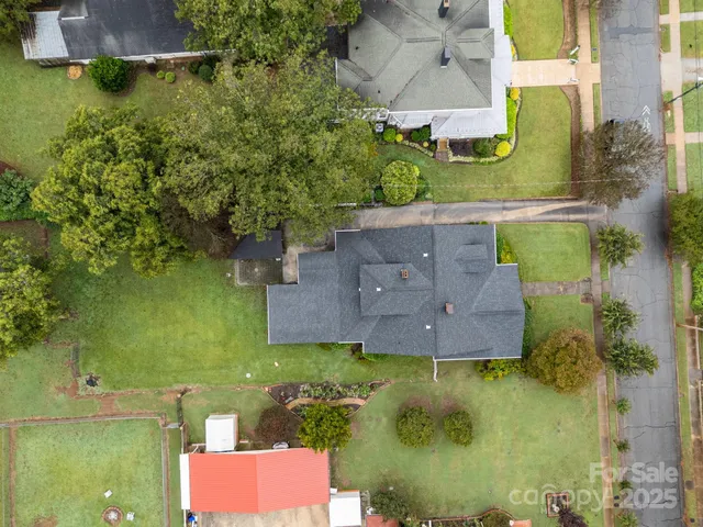 an aerial view of a city with lots of residential buildings
