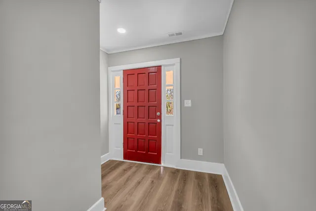 an empty room with windows