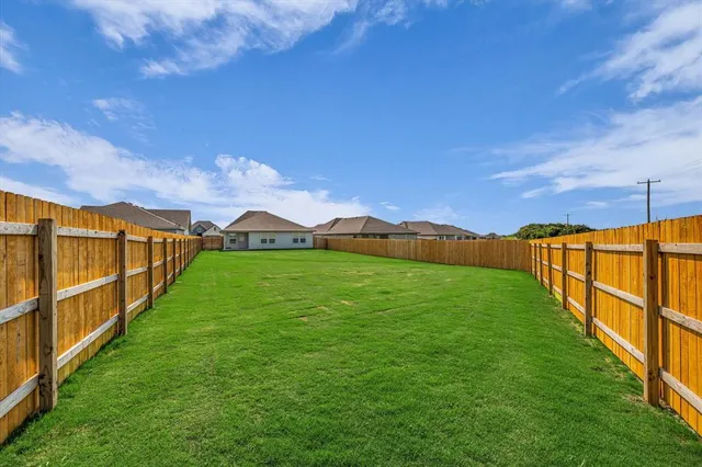 a view of a garden with an outdoor space