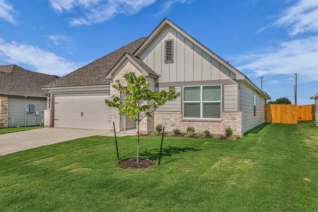 a house view with a garden space