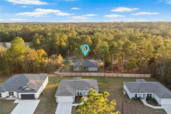 a view of a lake with a yard