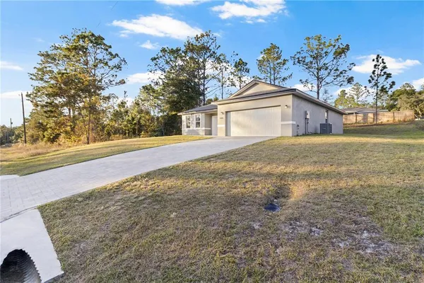 a house view with a outdoor space