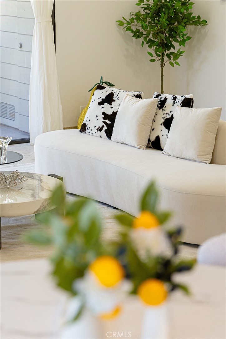 20 Nuevo, Unit 10 Irvine, CA 92612 - Photo 15 of 36 a bed sitting in a bedroom next to a yard