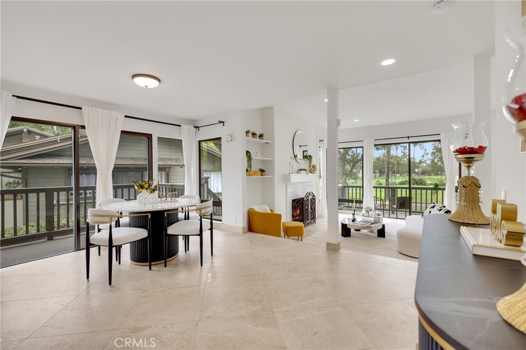 20 Nuevo, Unit 10 Irvine, CA 92612 - Photo 16 of 36 a view of a livingroom with furniture window and outside view
