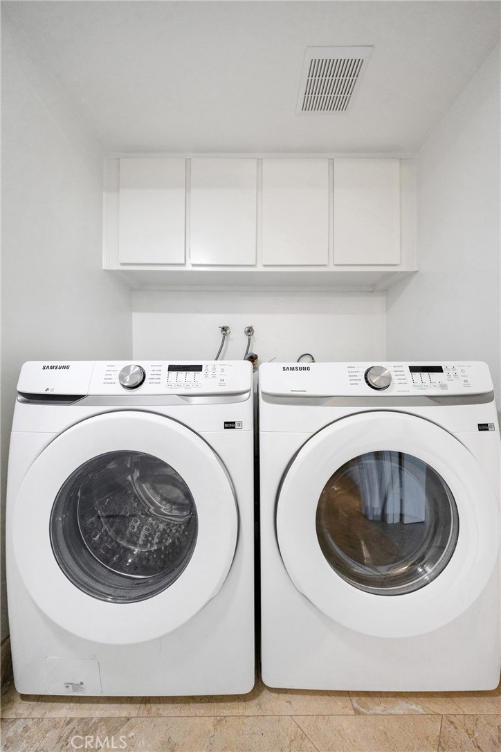 20 Nuevo, Unit 10 Irvine, CA 92612 - Photo 33 of 36 a utility room with sink dryer and washer