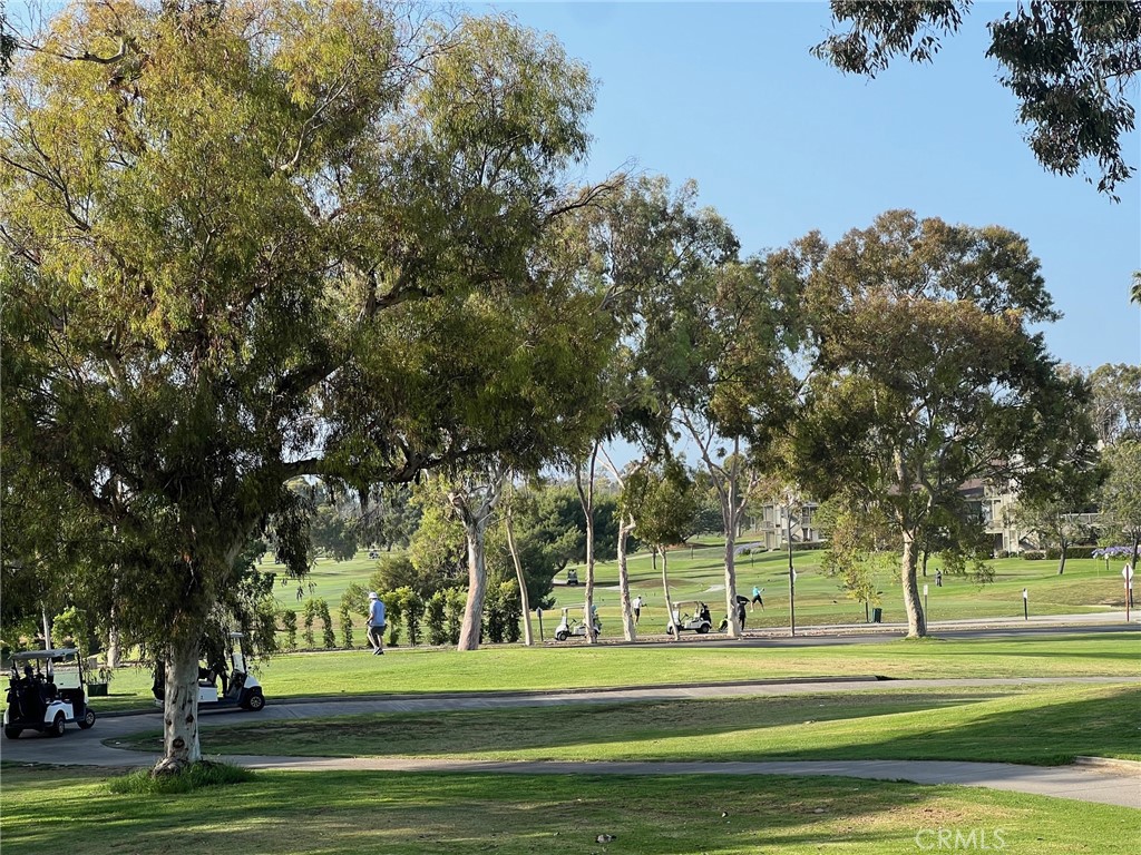 20 Nuevo, Unit 10 Irvine, CA 92612 - Photo 35 of 36 a building with trees in the background