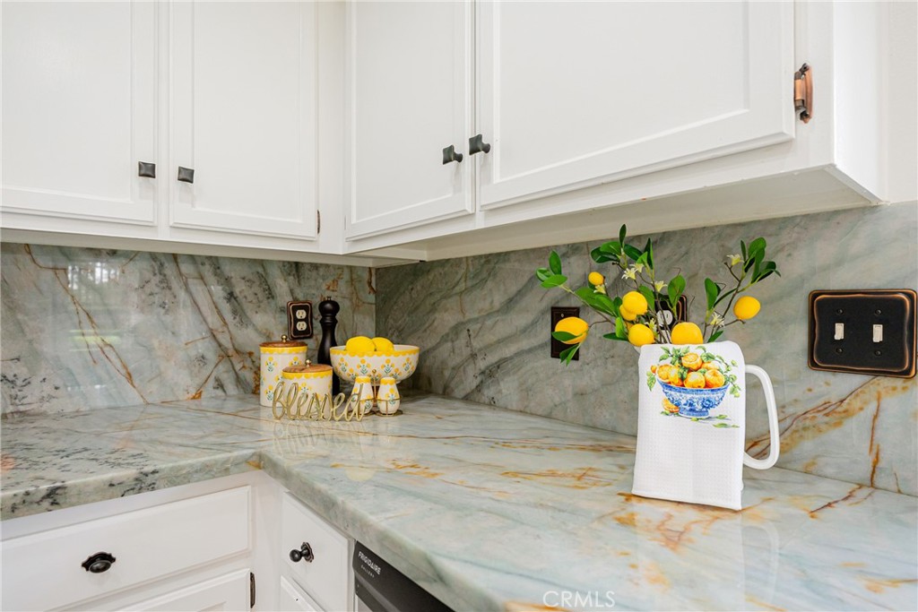 20 Nuevo, Unit 10 Irvine, CA 92612 - Photo 10 of 36 a bathroom with a sink and mirror