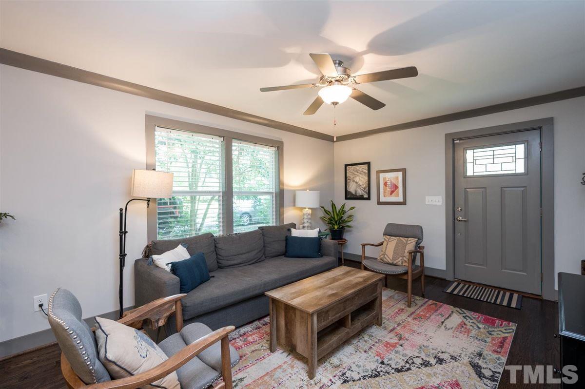 2446 Stevens Road Raleigh, NC 27610 - Photo 12 of 30 a living room with furniture and a large window