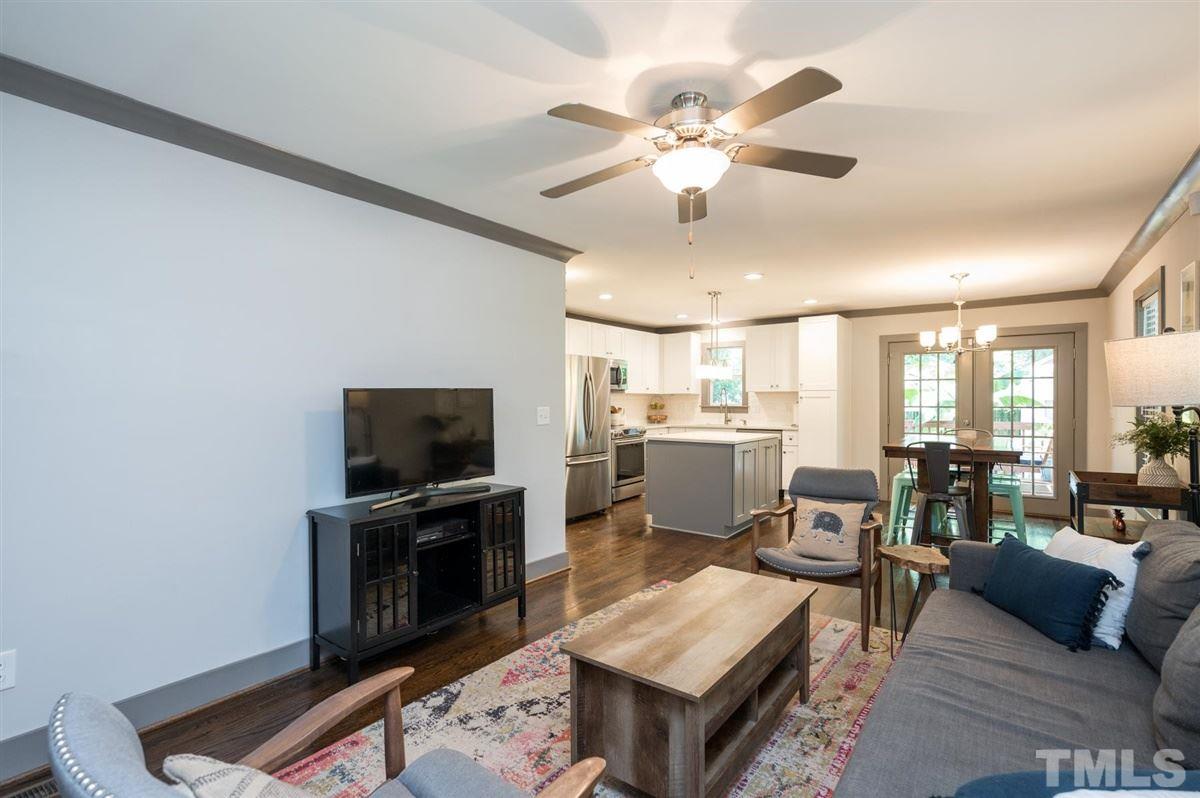 2446 Stevens Road Raleigh, NC 27610 - Photo 14 of 30 a living room with furniture and a flat screen tv