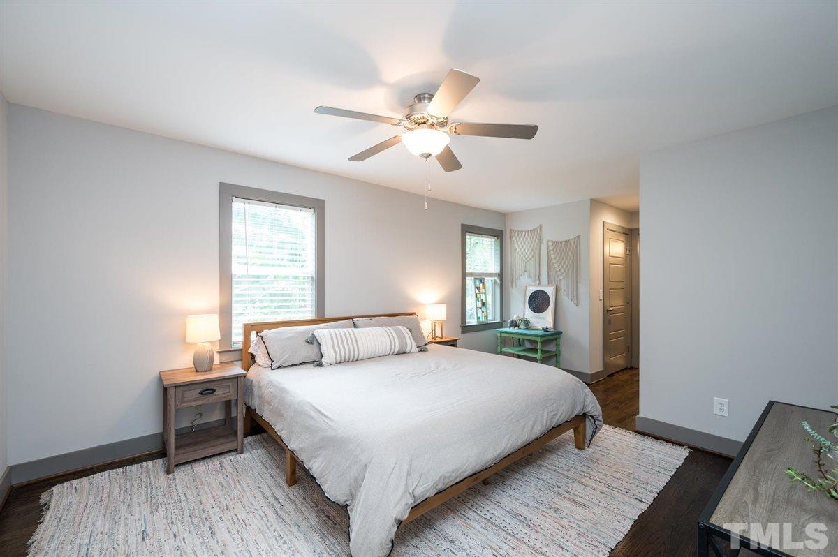 2446 Stevens Road Raleigh, NC 27610 - Photo 22 of 30 a bedroom with a bed and a window