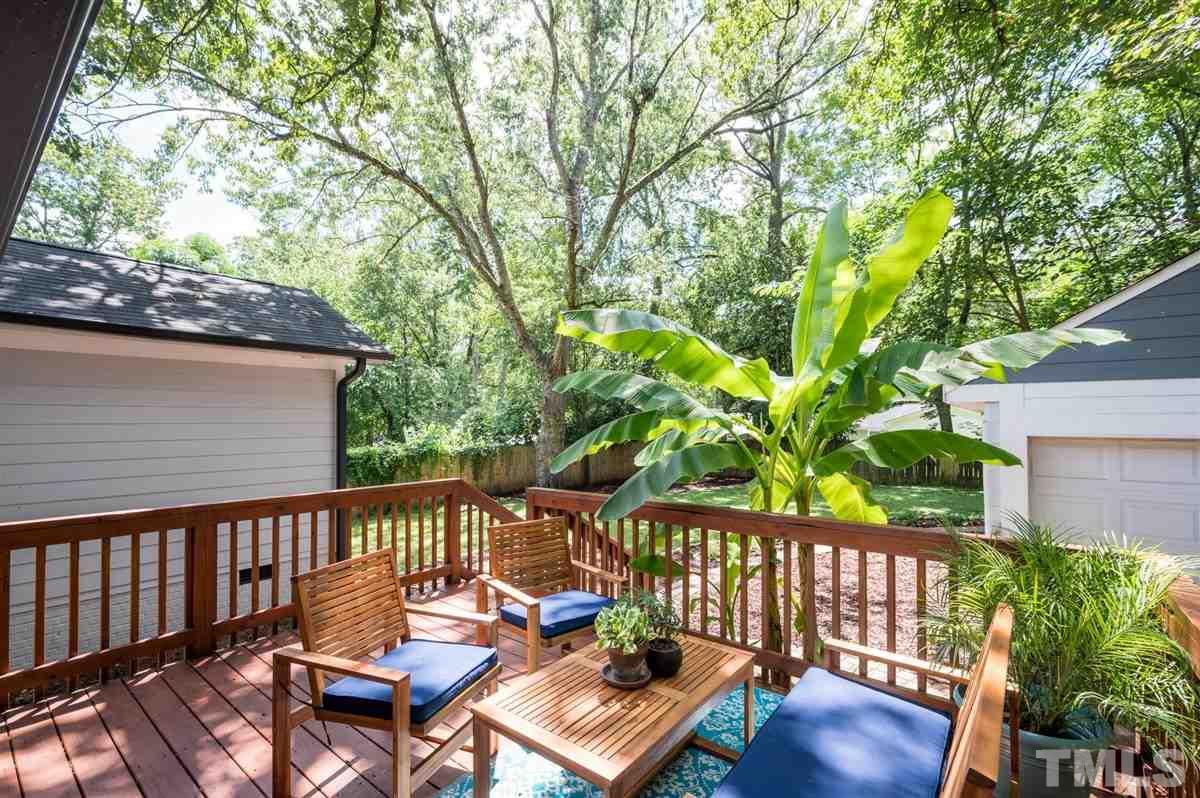 2446 Stevens Road Raleigh, NC 27610 - Photo 5 of 30 a view of a wooden bench on the roof deck