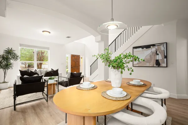 a living room with furniture and a table