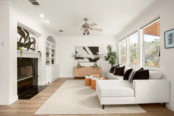 a living room with furniture and a large window