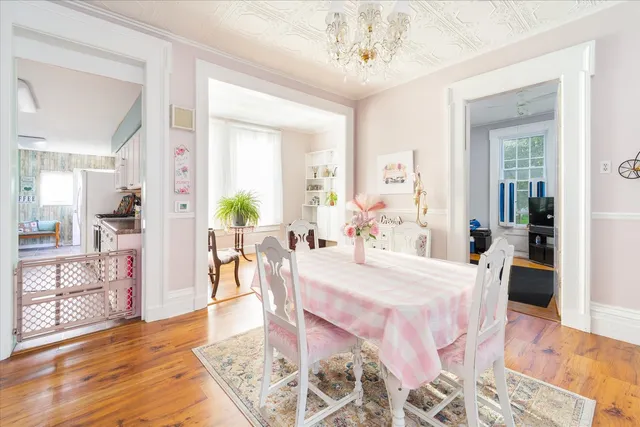 a view of a dining room with furniture