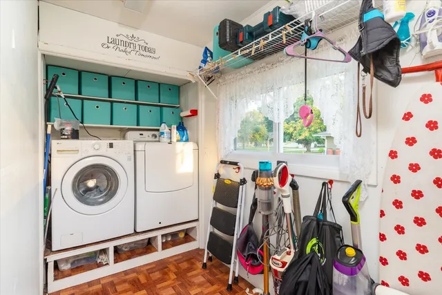 a utility room with dryer and washer