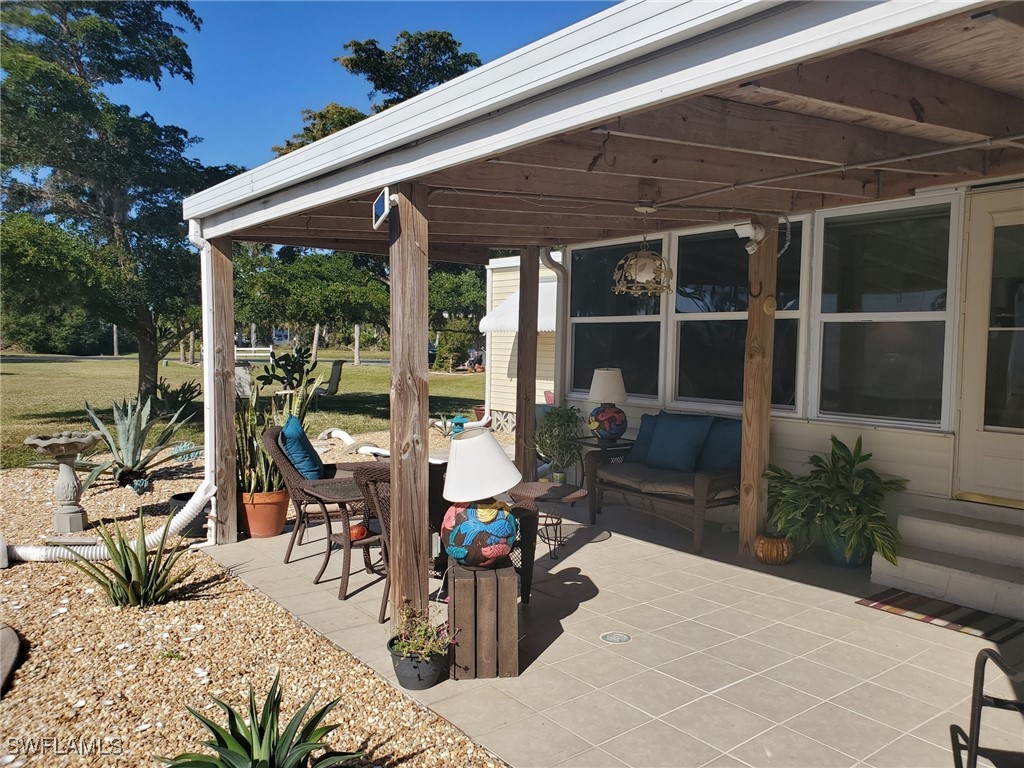 938 Lazy Lane North Fort Myers, FL 33917 - Photo 25 of 37 a view of entryway with wooden floor