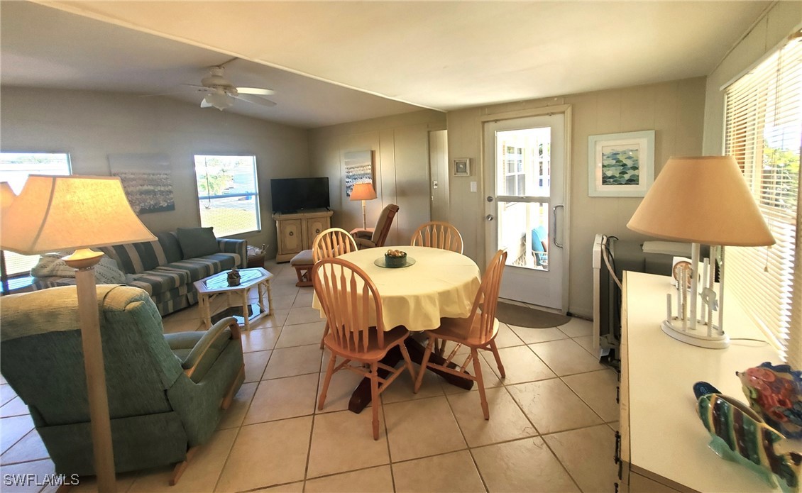 938 Lazy Lane North Fort Myers, FL 33917 - Photo 9 of 37 a living room with furniture and a window