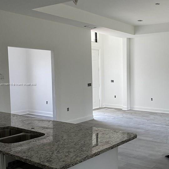 3911 Ordnance Road Lehigh Acres, FL 33971 - Photo 3 of 10 a view of a kitchen sink