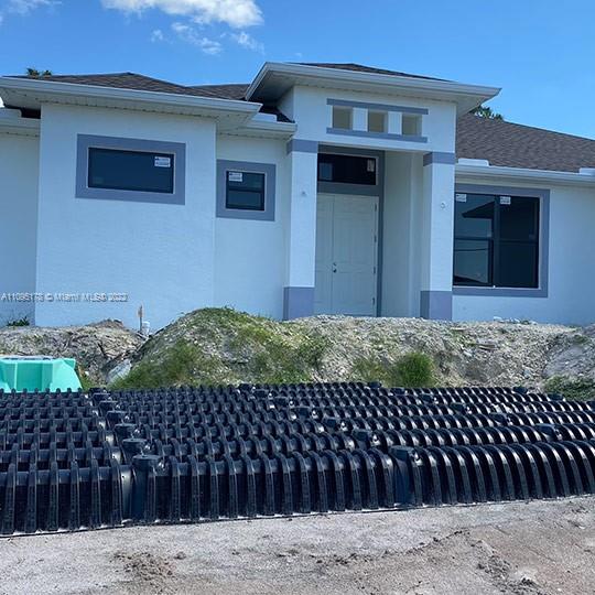 3911 Ordnance Road Lehigh Acres, FL 33971 - Photo 4 of 10 a front view of a house