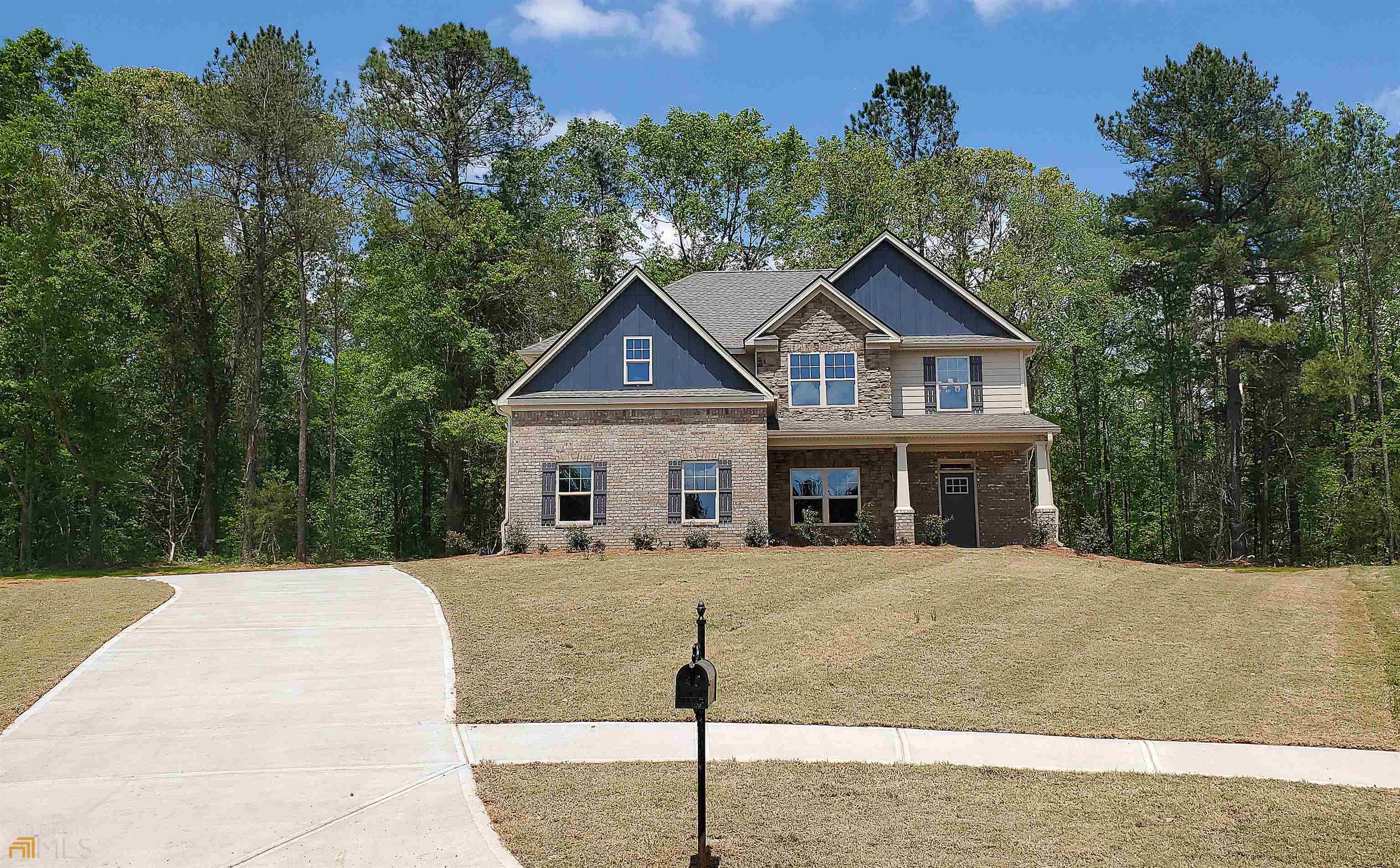 431 Homestead Circle Forsyth, GA 31029 - Photo 1 of 1 a front view of a house with a porch