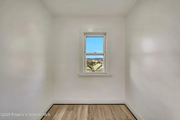 a view of a small space with a window