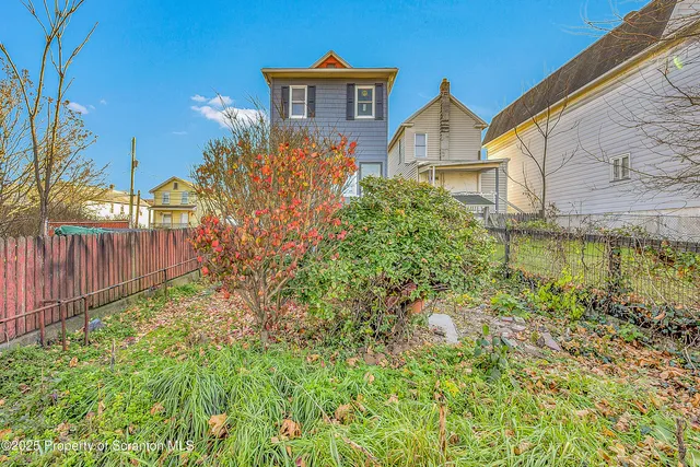 a view of a potted plants next to a building