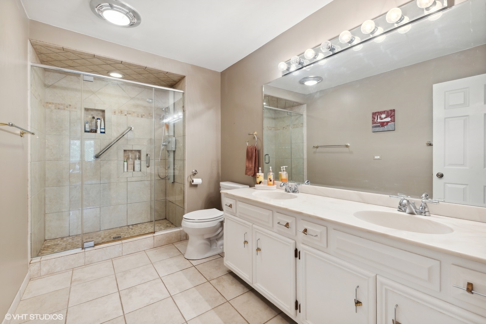 1483 West Shire Circle Inverness, IL 60067 - Photo 12 of 23 a spacious bathroom with a double vanity sink toilet and shower