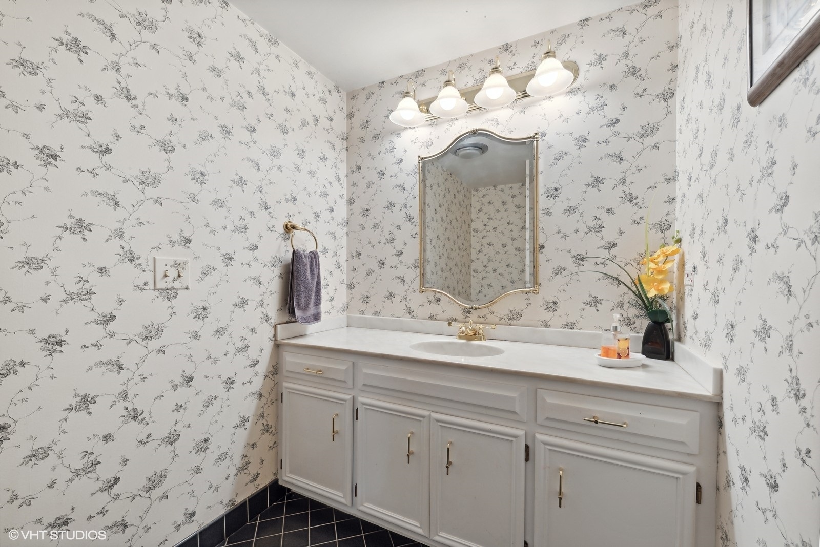 1483 West Shire Circle Inverness, IL 60067 - Photo 17 of 23 a bathroom with a sink a mirror and vanity