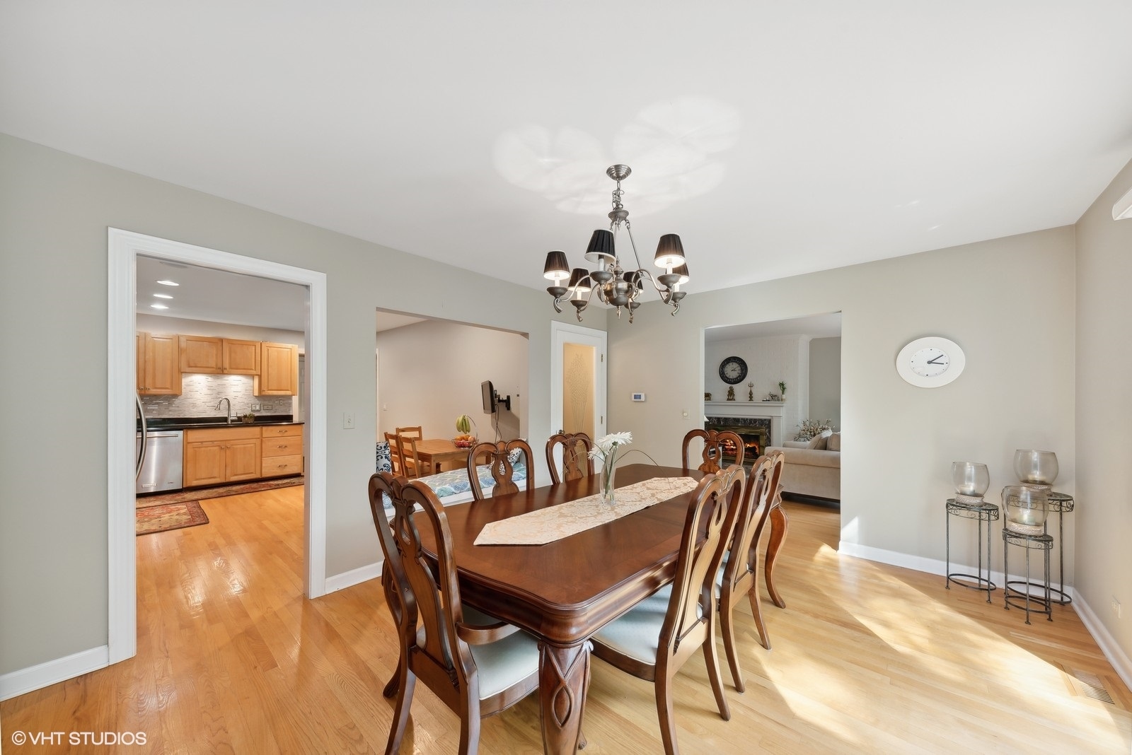 1483 West Shire Circle Inverness, IL 60067 - Photo 7 of 23 a view of a dining room with furniture and a chandelier