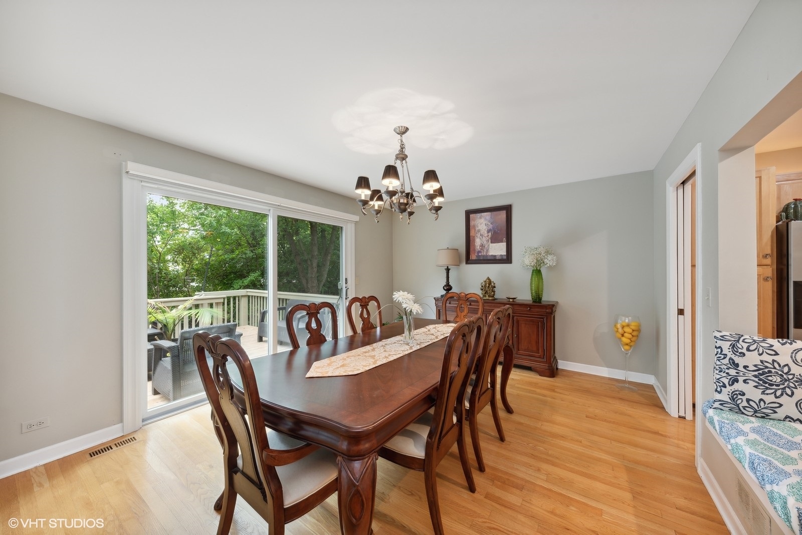 1483 West Shire Circle Inverness, IL 60067 - Photo 8 of 23 a view of a dining room with furniture window and wooden floor
