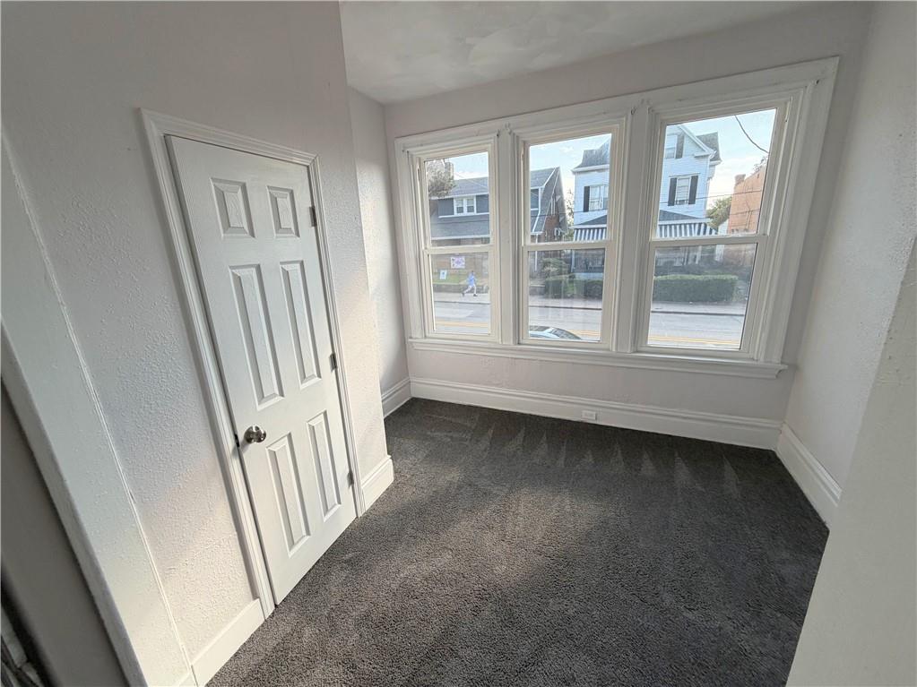 7709 Bennett Street, Unit 1 Pittsburgh, PA 15208 - Photo 2 of 6 an empty room with a window
