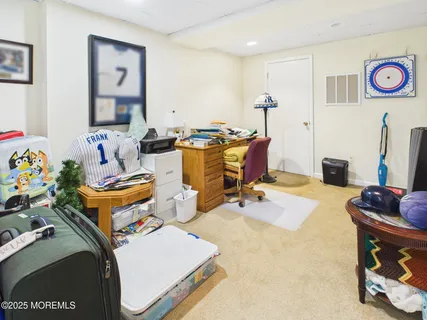 a room with furniture and a flat screen tv