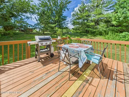 a view of a chairs on the deck