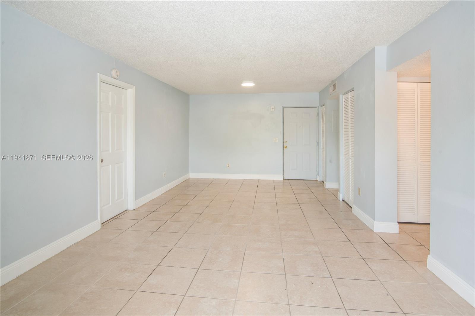 8200 Southwest 210th Street, Unit 111 Cutler Bay, FL 33189 - Photo 18 of 23 a view of an empty room