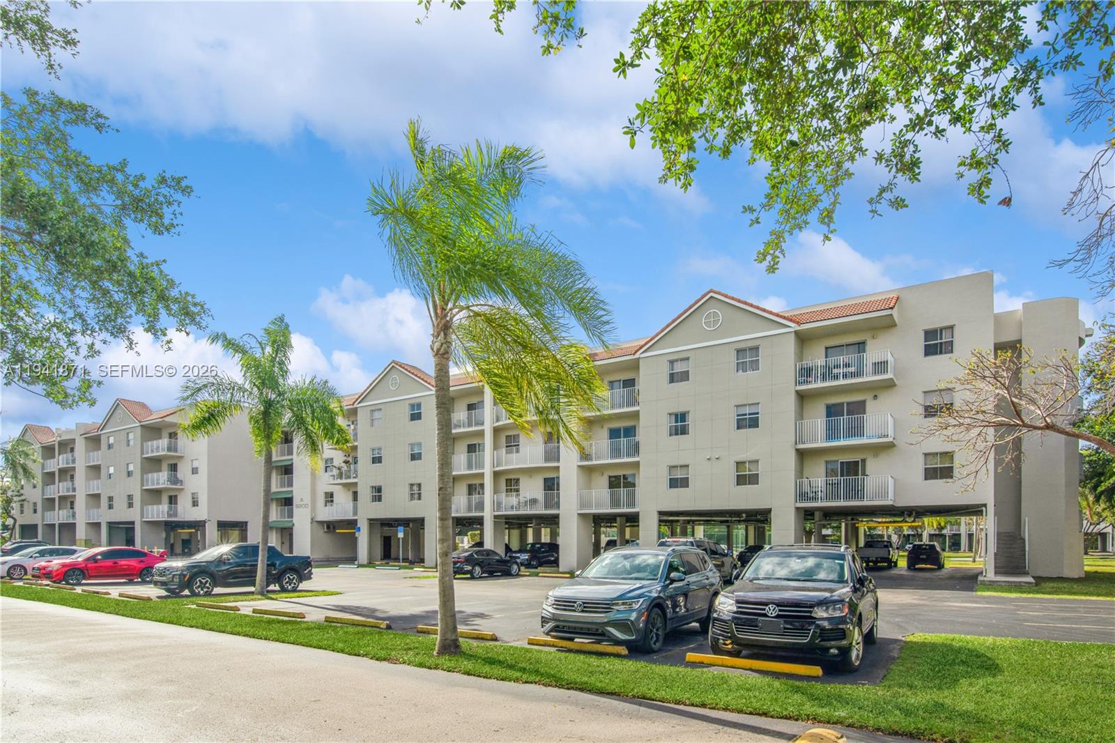 8200 Southwest 210th Street, Unit 111 Cutler Bay, FL 33189 - Photo 21 of 23 a building with sign broad in front of it