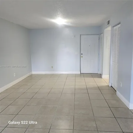 a bathroom with a toilet and a bathtub